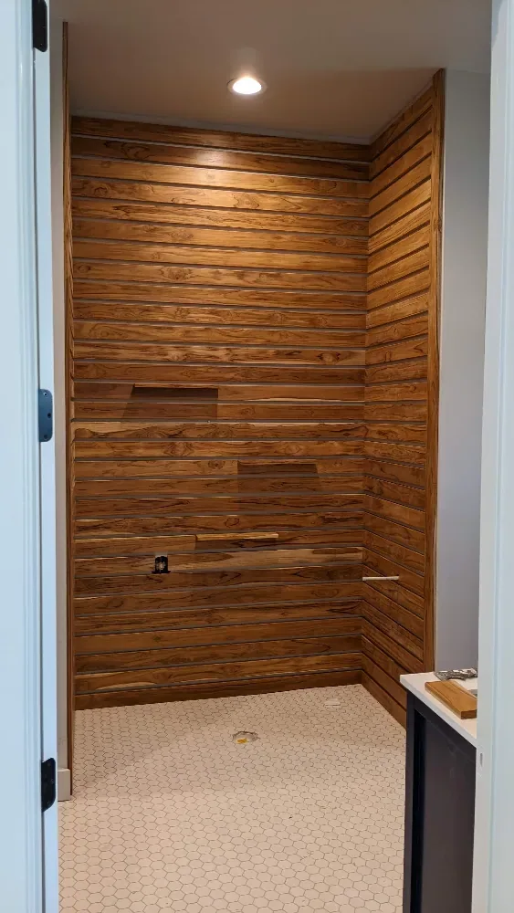 Primary bath — teak accent wall